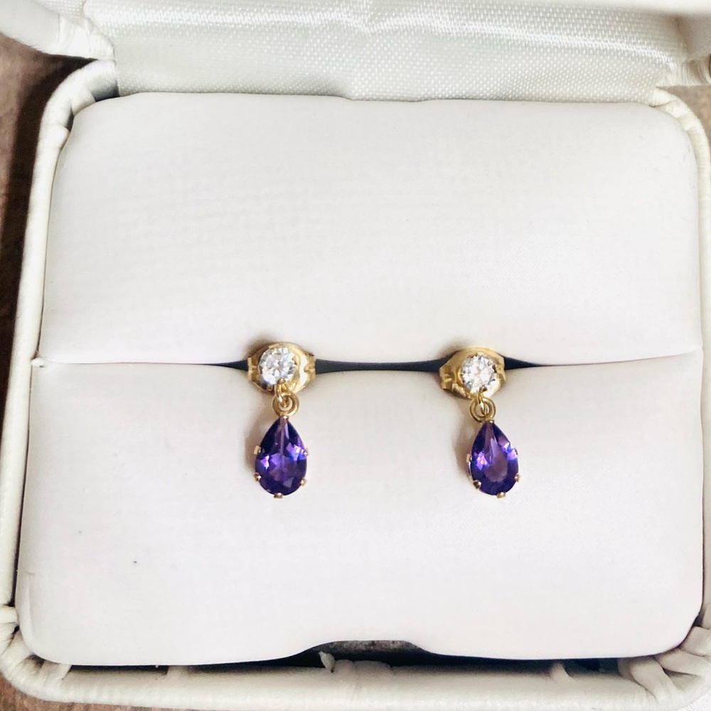 Amethyst & diamond drop earrings set in gold.
